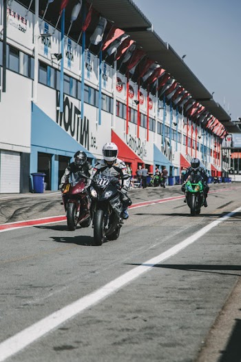 Photo of People Riding Motorcycle
