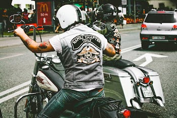 Photo of People Riding Motorcycles on Road