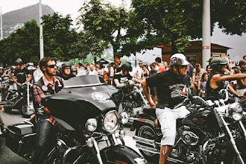 Photo of People Riding Motorcycles on Street
