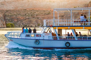 Photo of People Riding on Boat
