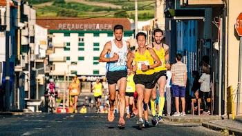 Photo of People Running on Street