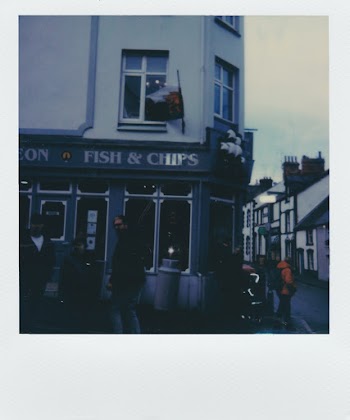 Photo of People Standing Near a Store