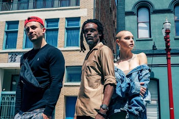 Photo of People Standing Near Buildings