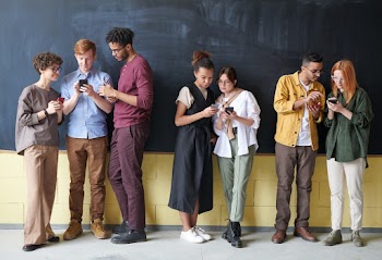 Photo Of People Standing Near Chalk Board