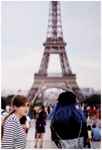 Photo of People Standing Near Eiffel Tower
