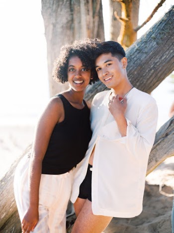 Photo Of People Standing Near Tree