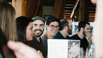 Photo of People Talking to Each Other