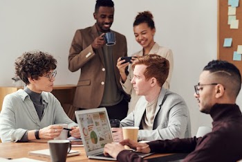 Photo Of People Talking To Each Other