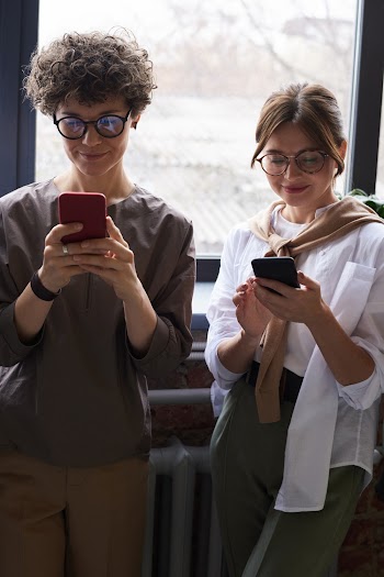 Photo Of People Using Smartphone