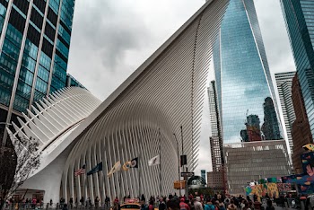 Photo of People Walking Near Buildings
