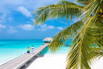 Photo Of People Walking On Dock 