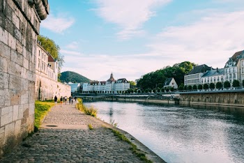 Photo of People Walking on Riverside