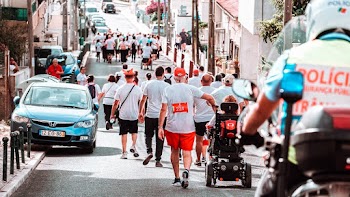 Photo of People Walking on Road