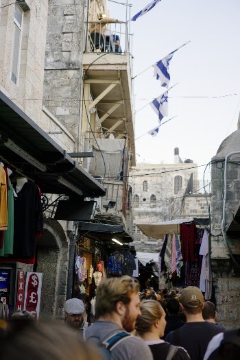 Photo of People Walking on Street