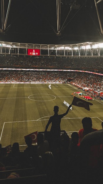 Photo of People Watching Football Match