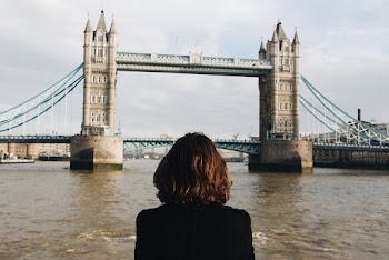 Photo of Person Across the London Bridge