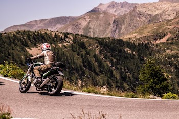 Photo Of Person Driving Motorcycle
