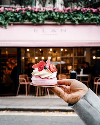 Photo Of Person Holding Cake