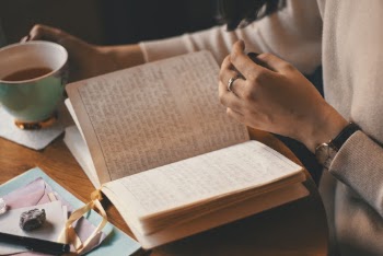 Photo Of Person Holding Cup
