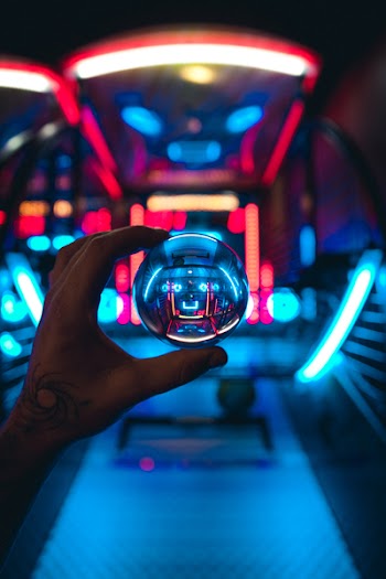 Photo of Person Holding Lensball