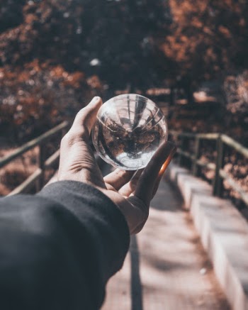 Photo of Person Holding Lensball