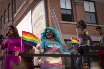 Photo of Person Holding Lgbt Flag