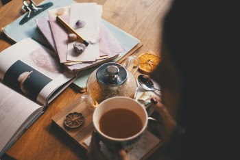Photo Of Person Holding Mug