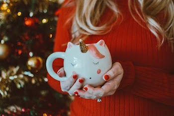 Photo Of Person Holding Mug