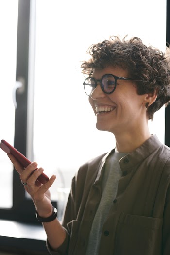 Photo Of Person Holding Smartphone