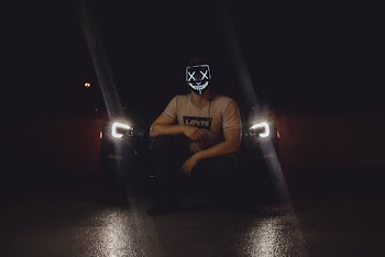 Photo of Person in Front of Car