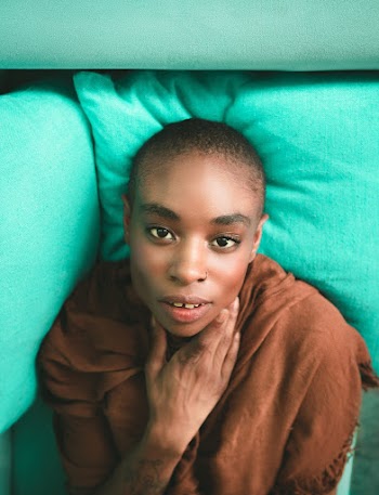 Photo of Person Lying on Bed
