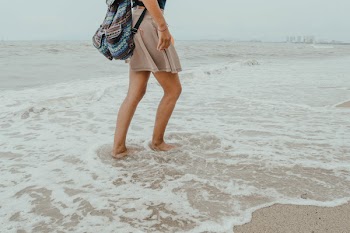 Photo of Person On Seashore