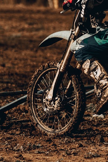 Photo of Person Riding Dirt Bike