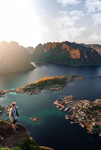 Photo Of Person Standing On Cliff
