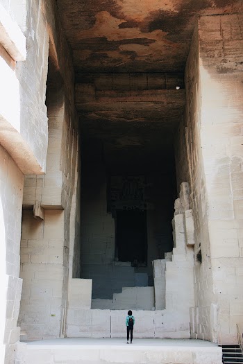 Photo of Person Standing on Concrete Blocks