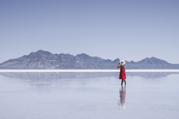 Photo of Person Standing on Shore