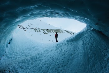 Photo of Person Standing on Snow
