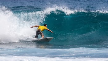 Photo of Person Surfing During Daytime