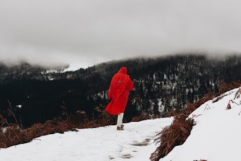 Photo Of Person Walking On Snow
