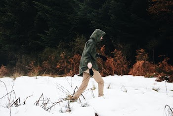Photo Of Person Walking On Snow
