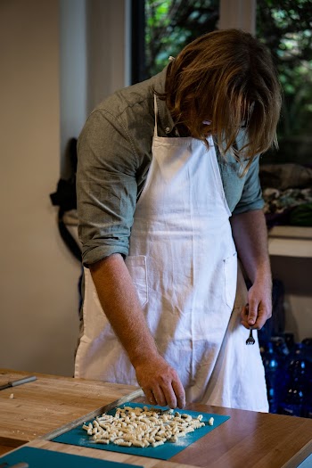 Photo Of Person Wearing Apron