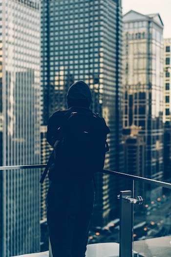 Photo of Person Wearing Backpack