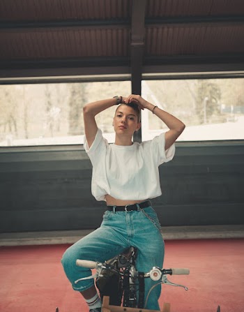 Photo of Person Wearing Blue Jeans