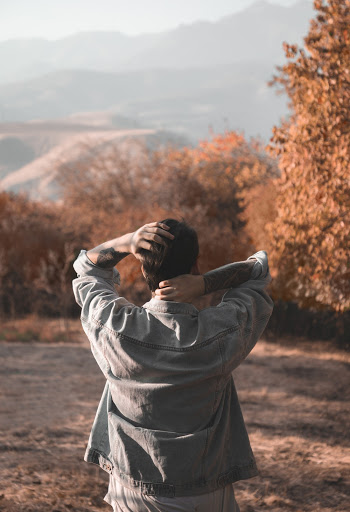 Photo Of Person Wearing Denim Jacket