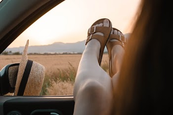 Photo of Person Wearing Sandals