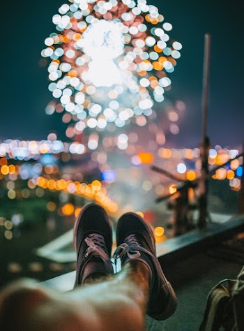 Photo of Person Wearing Sneakers