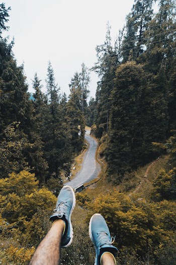 Photo of Person Wearing Sneakers