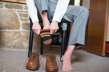 Photo of Person Wearing Socks