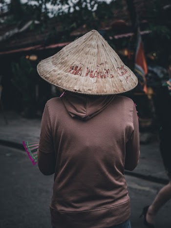 Photo Of Person Wearing Straw Hat