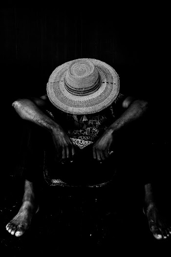 Photo Of Person Wearing Sun Hat